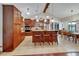 Spacious kitchen with granite countertops, stainless appliances and breakfast bar seating at 414 Summit Chase Dr, Valrico, FL 33594