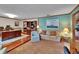 Office space with hardwood floors, custom built-ins, and sitting area at 414 Summit Chase Dr, Valrico, FL 33594