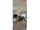 Comfortable living room featuring hardwood floors, a ceiling fan, a fireplace, and sliding glass doors to the pool at 4500 Onorio St, New Port Richey, FL 34653