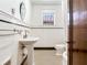 Vintage style bathroom featuring subway tile and a pedestal sink at 4521 W Azeele St, Tampa, FL 33609