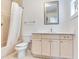Bathroom featuring tile floor and shower and white vanity at 4521 W Azeele St, Tampa, FL 33609