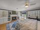 This bedroom features hardwood floors, a fireplace, and a set of french doors at 4611 Ackerly Way, Brandon, FL 33511