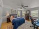 Bedroom featuring a fan, hardwood floor and neutral colors at 4611 Ackerly Way, Brandon, FL 33511