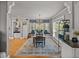 Spacious dining room with hardwood floors, chandelier lighting and built-in seating at 4611 Ackerly Way, Brandon, FL 33511