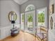 Entryway with natural light and a hardwood floor at 4611 Ackerly Way, Brandon, FL 33511