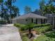 Charming home featuring well-maintained landscaping, attached garage and screened porch at 4611 Ackerly Way, Brandon, FL 33511