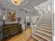 Spacious foyer with hardwood floors, a staircase, and decorative lighting at 4611 Ackerly Way, Brandon, FL 33511