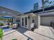 Covered patio area with neutral furnishings perfect for outdoor entertaining at 4611 Ackerly Way, Brandon, FL 33511