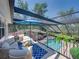 Inviting outdoor space with a view of the sparkling pool below at 4611 Ackerly Way, Brandon, FL 33511