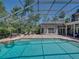Gorgeous in-ground pool with lounging areas and serene greenery at 4611 Ackerly Way, Brandon, FL 33511