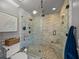 This stand up shower features a rainfall showerhead and a glass door at 4611 Ackerly Way, Brandon, FL 33511