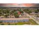 Real estate location view of the house surrounded by trees and an apartment building nearby at 4684 72 N Ave, Pinellas Park, FL 33781