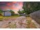 Large backyard with a storage shed, gravel area, and privacy fence, offering ample space and utility at 4684 72 N Ave, Pinellas Park, FL 33781