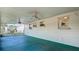 View of the enclosed lanai, offering an ideal outdoor space and access to natural light, ceiling fan included at 4915 Chariton Ave, Tampa, FL 33603