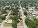 Aerial view of a charming residential neighborhood with tree-lined streets and a variety of cozy homes at 5106 15Th S Ave, Gulfport, FL 33707