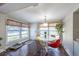 Bright dining area with hardwood floors, modern lighting, and a table with seating for four at 5106 15Th S Ave, Gulfport, FL 33707