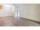 Open dining area with wood-look floors and adjacent to the kitchen at 5115 Stonehaven Ct, Tampa, FL 33624