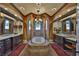 A luxurious primary bathroom featuring a deep soaking tub, dual vanities, and a separate shower at 5417 Tybee Island Dr, Apollo Beach, FL 33572