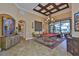 Spacious game room with billiard table, stylish decor, and a view of the outdoor pool area at 5417 Tybee Island Dr, Apollo Beach, FL 33572