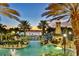 Community pool featuring water slides and a lighthouse at 5417 Tybee Island Dr, Apollo Beach, FL 33572