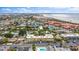 Wide aerial view showing colorful beach homes and condos near the beach at 600 71St Ave # 16, St Pete Beach, FL 33706