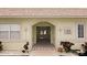 Inviting entrance with a brick pathway and tiled archway at 600 71St Ave # 16, St Pete Beach, FL 33706