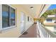 Exterior view of a condominium with palm trees at 600 71St Ave # 16, St Pete Beach, FL 33706