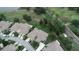 Beautiful aerial view of a golf course community with well-maintained lawns and landscaping at 611 Tremont Greens Ln, Sun City Center, FL 33573