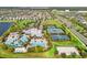 Extensive community amenities including a pool with water slide, tennis and basketball courts, and sand volleyball court at 6123 Golden Nettle Dr, Apollo Beach, FL 33572