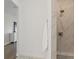 Bathroom features marble floors and a glass shower with a rainfall showerhead at 6123 Golden Nettle Dr, Apollo Beach, FL 33572