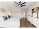 Spacious bedroom with hard wood floors and an elegant ceiling fan at 6123 Golden Nettle Dr, Apollo Beach, FL 33572