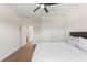 Comfortable bedroom featuring hardwood floors and a closet, offering a peaceful retreat at 6123 Golden Nettle Dr, Apollo Beach, FL 33572