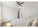 Spacious bedroom featuring a ceiling fan and closet, perfect for relaxation at 6123 Golden Nettle Dr, Apollo Beach, FL 33572