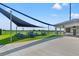 The community features an outdoor recreation area with picnic tables, a sun shelter, and a building with shade and restrooms at 6123 Golden Nettle Dr, Apollo Beach, FL 33572