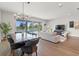 Open concept living space with sleek furniture and modern finishes at 6123 Golden Nettle Dr, Apollo Beach, FL 33572