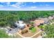 Breathtaking aerial perspective highlights the property's location, verdant landscaping, and surrounding neighborhood at 613 Sportsman Park Dr, Seffner, FL 33584