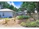 Lush backyard featuring patio and landscaping, plus access to the refreshing swimming pool at 613 Sportsman Park Dr, Seffner, FL 33584