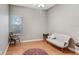 Relaxing bedroom with hardwood floors, neutral walls, and classic furniture at 613 Sportsman Park Dr, Seffner, FL 33584