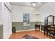 Comfortable bedroom with wood floors, neutral walls, and traditional furnishings at 613 Sportsman Park Dr, Seffner, FL 33584