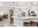 Spacious kitchen with granite countertops, stainless steel appliances, and pendant lighting at 613 Sportsman Park Dr, Seffner, FL 33584