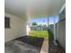 Covered patio overlooking the backyard and shed on a sunny day at 6282 41St N Ave, St Petersburg, FL 33709