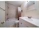 Bright bathroom featuring a shower and tub combination with updated vanity at 6282 41St N Ave, St Petersburg, FL 33709