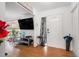 Welcoming entryway featuring wood floors, a decorative front door, and stylish furnishings for a warm greeting at 7700 Willow Brook Ct, Hudson, FL 34667