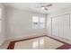 The bedroom has natural light from windows and ample storage with its spacious closet at 909 E 15Th Ave, Tampa, FL 33605