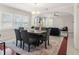 Charming dining area with ample natural light and open access to the living room at 909 E 15Th Ave, Tampa, FL 33605