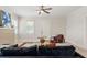 Inviting living room with fireplace and natural light, offering a cozy atmosphere at 909 E 15Th Ave, Tampa, FL 33605