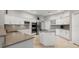 Well-appointed kitchen boasts stainless steel appliances, backsplash design and ample counter space at 9348 Deer Creek Dr, Tampa, FL 33647