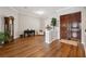 Front room with hardwood floors and custom front door at 9348 Deer Creek Dr, Tampa, FL 33647