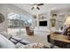 Gathering room with large sliding doors leading to the pool at 9348 Deer Creek Dr, Tampa, FL 33647