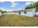 The home features a spacious fenced backyard at 10110 Pepperidge Ct, Tampa, FL 33615